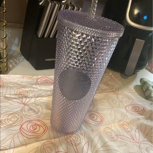Silver studded Starbucks cup